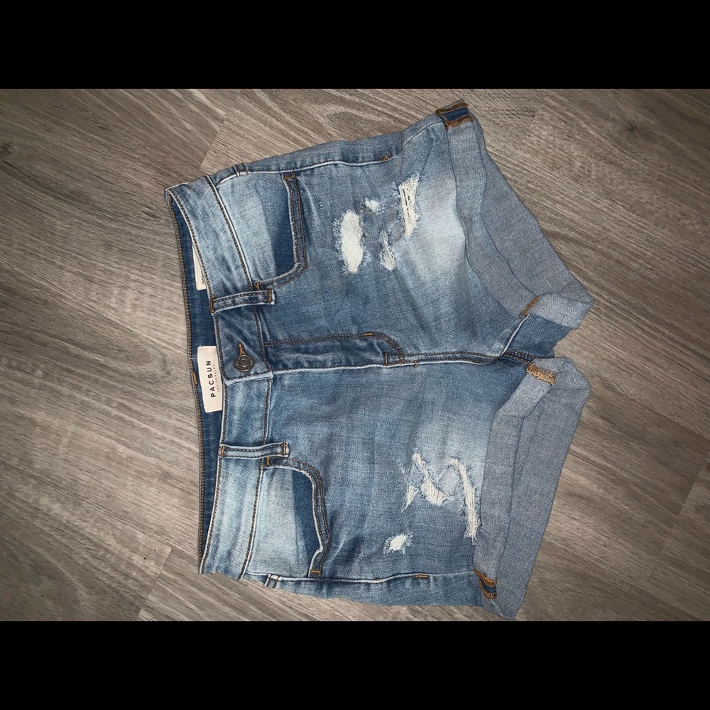 Passing Distressed Denim Shorts